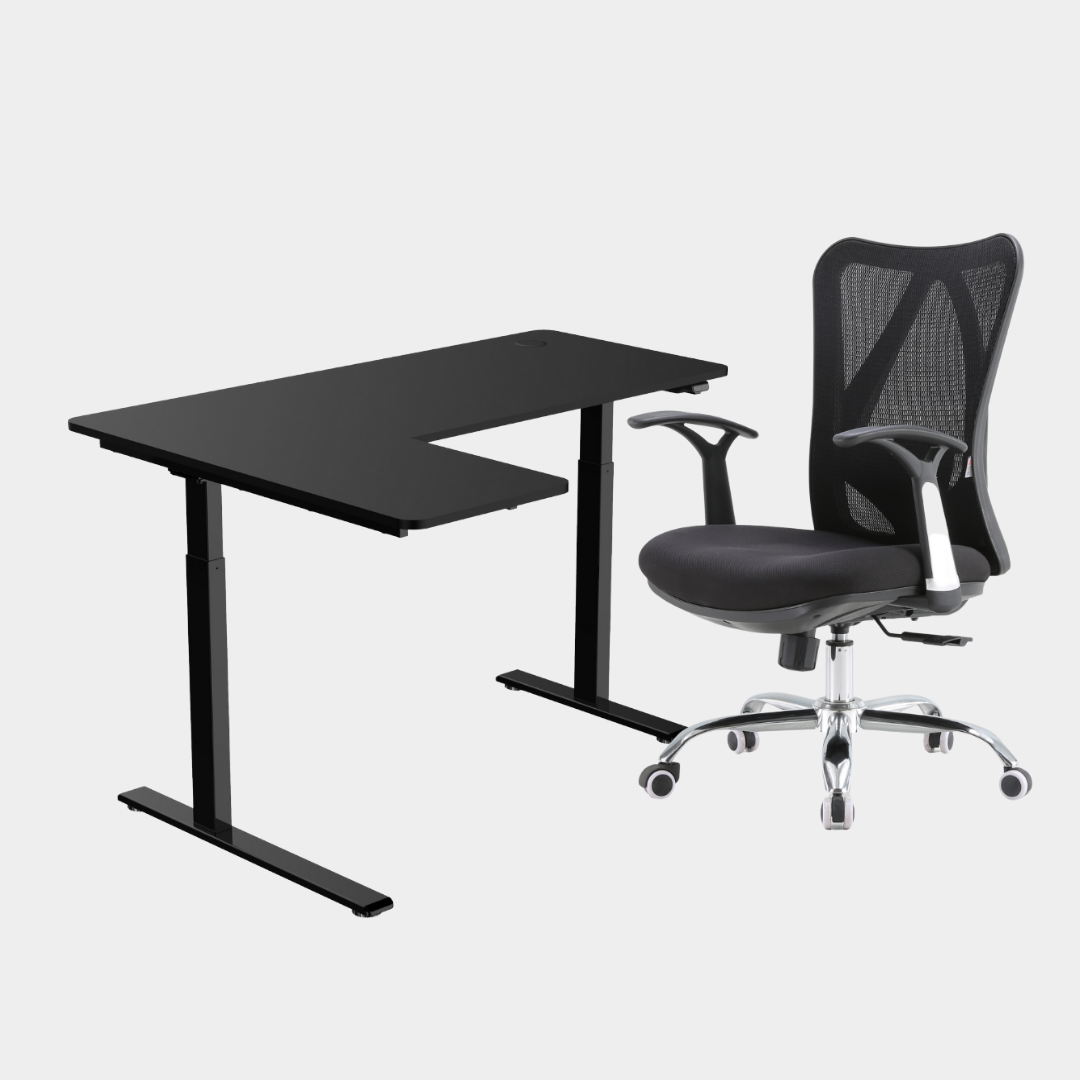 An L-shaped height-adjustable desk with a black tabletop and black legs and chair viewed from a front angle against a white background.