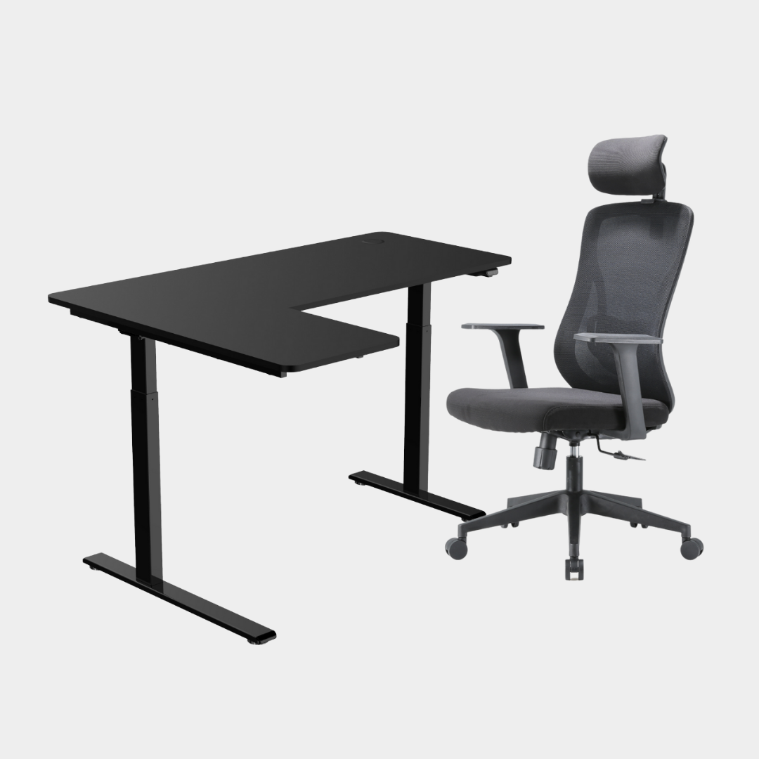 An L-shaped height-adjustable desk with a black tabletop and black legs and chair viewed from a front angle against a white background.