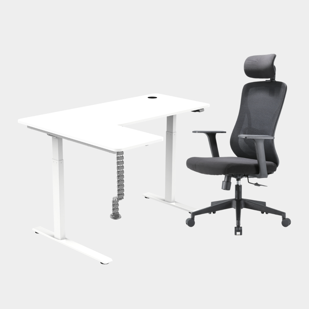 An L-shaped height-adjustable desk with a white tabletop and white legs, with grey cable management and chair viewed from a front angle against a white background.