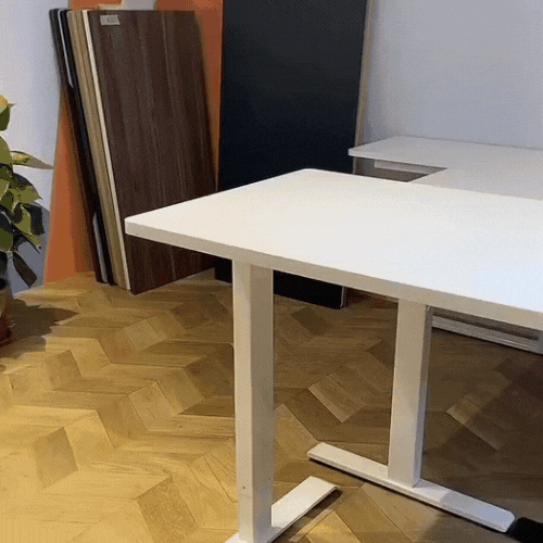video of white height adjustable desk